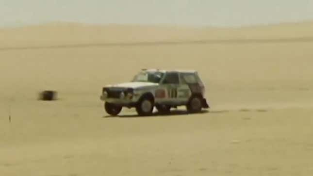 A screenshot of a Lada Niva car racing on sand. 