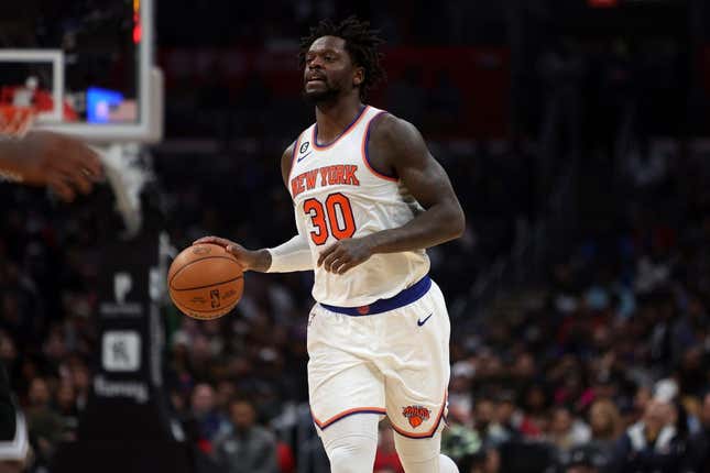 Mar 11, 2023; Los Angeles, California, USA;  New York Knicks forward Julius Randle (30) brings the ball up court during the third quarter against the Los Angeles Clippers at Crypto.com Arena.