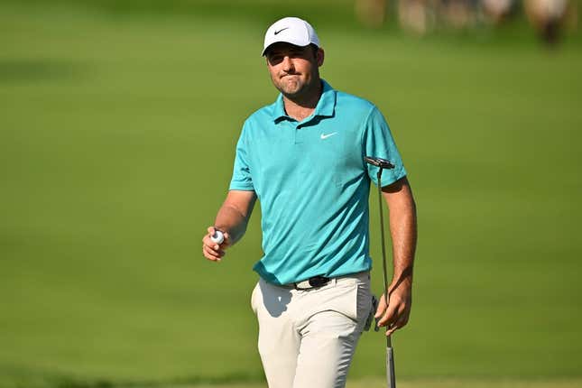 Aug 20, 2023; Olympia Fields, Illinois, USA; Scottie Scheffler walks off the 18th green after finishing the final round of the BMW Championship golf tournament.