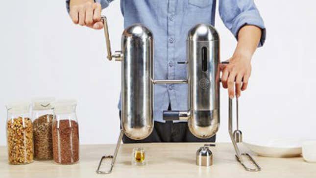 Image for article titled This steampunk contraption allows you to make your own nut oils