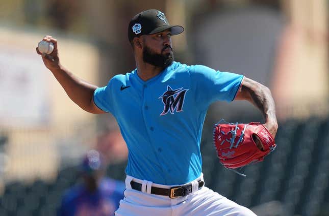 Mar 1, 2023; Jupiter, Florida, USA; Miami Marlins starting pitcher Sandy Alcantara (22) pitches against the New York Mets in the second inning at Roger Dean Stadium.