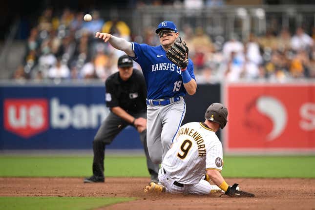 May 17, 2023; San Diego, California, USA; Kansas City Royals second baseman Michael Massey (19) throws to first base after forcing out San Diego Padres first baseman Jake Cronenworth (9) at second base to complete a double play during the third inning at Petco Park.