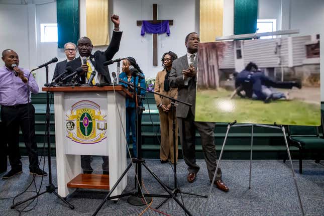Civil rights attorney Ben Crump raises his fist while speaking during a press conference at the Renaissance Church of God in Christ Family Life Center in Grand Rapids on Thursday, April 14, 2022. Crump is representing the family of Patrick Lyoya, who was shot and killed by a GRPD officer on April 4.