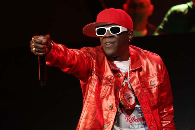 PHOENIX, ARIZONA - FEBRUARY 10: Flavor Flav performs onstage during the Bud Light Super Bowl Music Festival at Footprint Center on February 10, 2023 in Phoenix, Arizona.