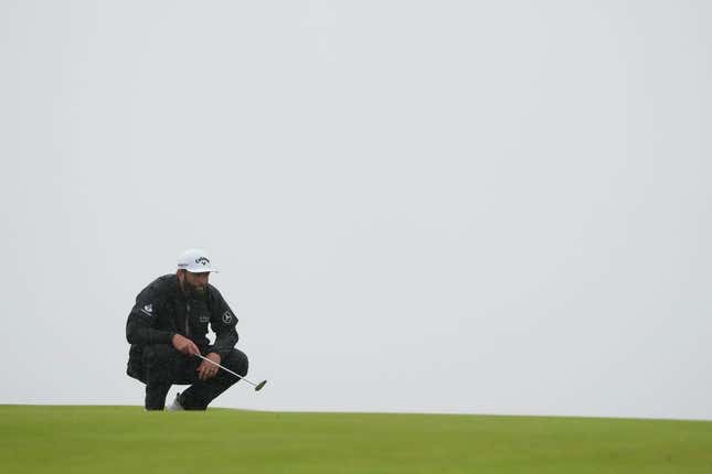 Jul 23, 2023; Hoylake, England, GBR; Jon Rahm lines up a putt on the 13th green during the final round of The Open Championship golf tournament.