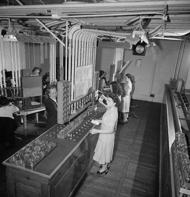 Over six miles of pneumatic tubes carry messages in the Curb Exchange&#039;s ultra-modern system of communications in New York City, Sept. 6, 1947. In this portion of the tube room clerks are -routing buy and sell orders from telephone clerks to the individual trading posts. Orders requiring prompt action are signaled or handed by the clerks on the floor to the brokers. Orders not so urgent other communications are handled through the tube system. ()