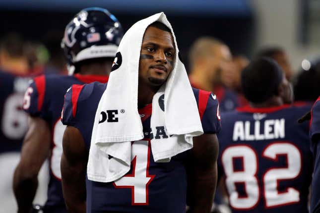 Deshaun Watson (4) walks along the sideline in the first half of a preseason NFL football game against the Dallas Cowboys in Arlington, Texas, on Aug. 24, 2019. Thirty women who had accused the Houston Texans of turning a blind eye to allegations that Watson was sexually assaulting and harassing women during massage sessions have settled their legal claims against his former team, the Houston Texans, their attorney said Friday, July 15, 2022. Watson, who has since been traded to the Cleveland Browns, has denied any wrongdoing and vowed to clear his name.