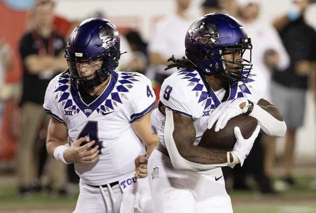 Sep 16, 2023; Houston, Texas, USA; TCU Horned Frogs quarterback Chandler Morris (4) hands the ball off to running back Emani Bailey (9) against the Houston Cougars in the first half at TDECU Stadium.