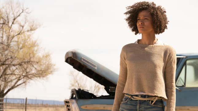 Gugu Mbatha-Raw standing in a filed in fast color
