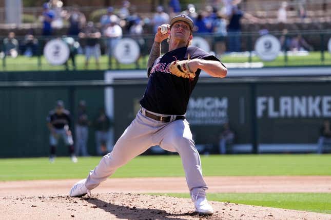 Mar 13, 2023; Phoenix, Arizona, USA; Cleveland Guardians starting pitcher Zach Plesac (34) pitches against the Los Angeles Dodgers during the first inning at Camelback Ranch-Glendale.