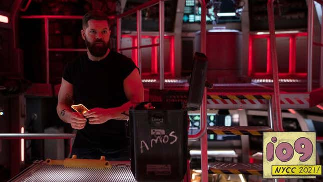 Amos Burton (Wes Chatham) aboard a red-hued Rocinante on The Expanse.