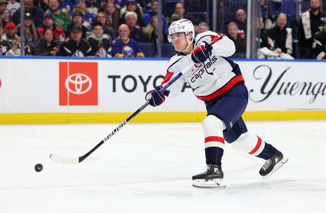 Feb 26, 2023; Buffalo, New York, USA; Washington Capitals right wing Nicolas Aube-Kubel (96) takes a shot on goal during the first period against the Buffalo Sabres at KeyBank Center.