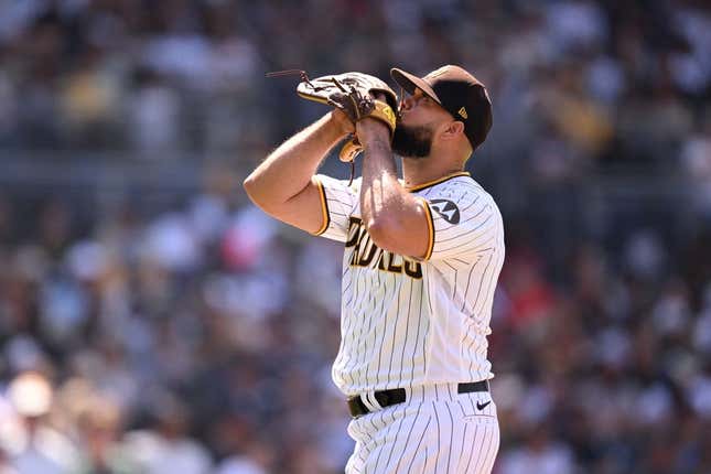 Apr 19, 2023; San Diego, California, USA; San Diego Padres relief pitcher Luis Garcia (66) walks to the dugout after being replaced during the eighth inning against the Atlanta Braves at Petco Park.
