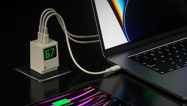 The Shargeek Retro 67 charger connected to several devices using USB-C cables.