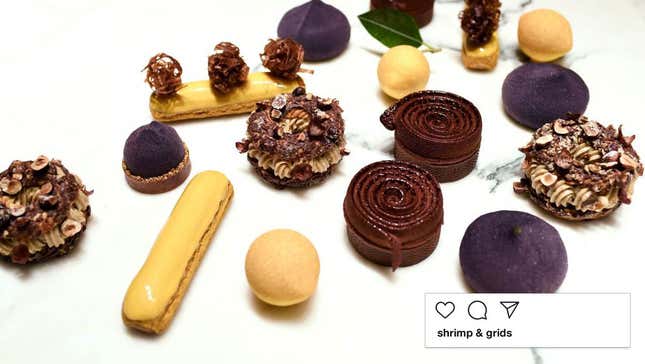 Luxury bite-sized chocolate desserts on a white marble surface