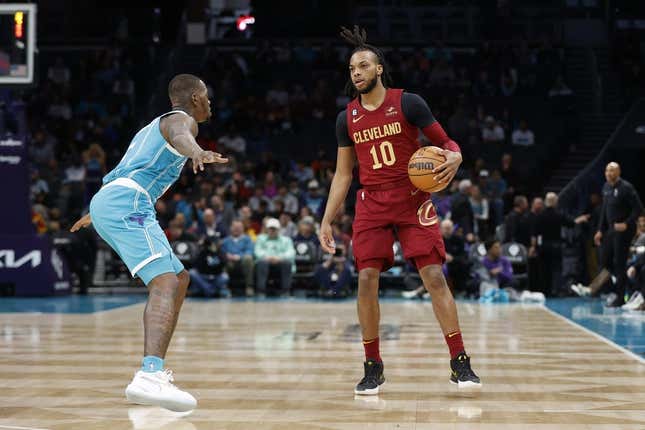 Mar 12, 2023; Charlotte, North Carolina, USA; Cleveland Cavaliers guard Darius Garland (10) is guarded by Charlotte Hornets guard Terry Rozier (3) during the first half at Spectrum Center.