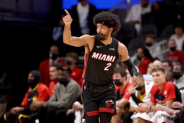 Jan 12, 2022; Atlanta, Georgia, USA; Miami Heat guard Gabe Vincent (2) reacts after a basket during the fourth quarter against the Atlanta Hawks at State Farm Arena.