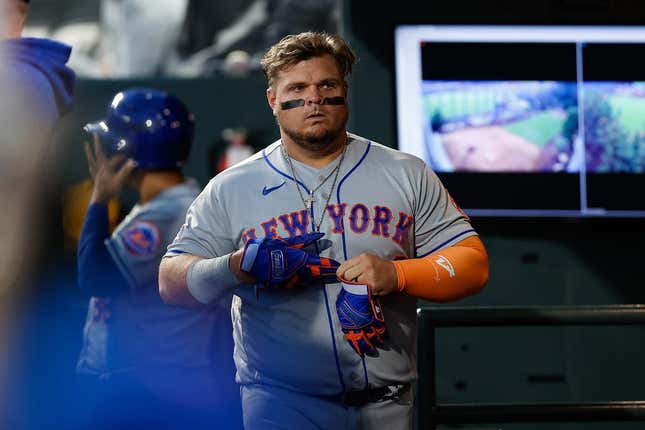 May 26, 2023; Denver, Colorado, USA; New York Mets designated hitter Daniel Vogelbach (32) in the dugout after striking out in the sixth inning against the Colorado Rockies at Coors Field.