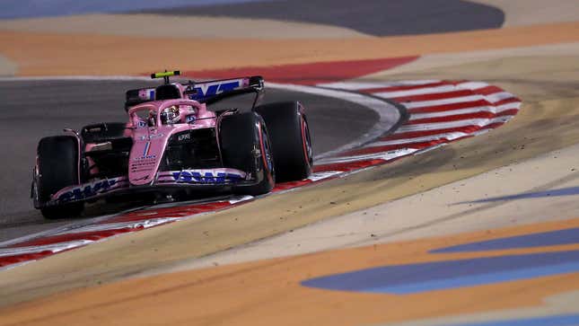 A photo of Pierre Gasly racing his Alpine F1 car in Bahrain. 