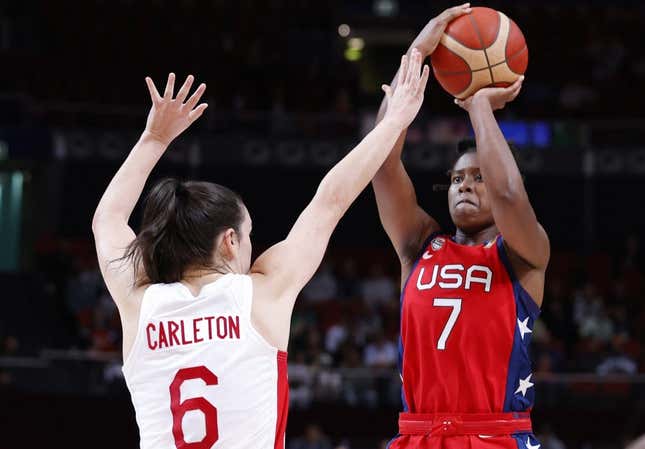 Sep 30, 2022; Sydney, AUS; USA player Ariel Atkins (7) makes a shot against Canada player Bridget Carleton (6) in the second quarter at Sydney SuperDome.