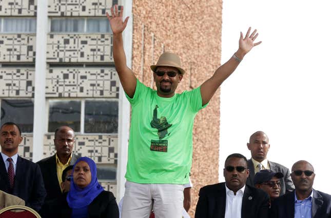 Ethiopian Prime Minister Abiy Ahmed waves to supporters as he attends rally in Addis Ababa, Ethiopia June 23, 2018.