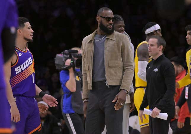 Mar 22, 2023; Los Angeles, California, USA; Los Angeles Lakers forward LeBron James (6) looks on from the bench in the second half against the Phoenix Suns at Crypto.com Arena.