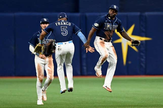 Apr 11, 2023; St. Petersburg, Florida, USA; Tampa Bay Rays left fielder Randy Arozarena (56) and shortstop Wander Franco (5) celebrate  after defeating the Boston Red Sox at Tropicana Field.