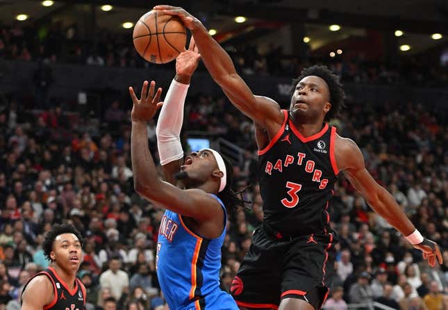 Mar 16, 2023; Toronto, Ontario, CAN; Toronto Raptors forward OG Anunoby (3) blocks a shot from Oklahoma City Thunder guard Luguentz Dort (5) in the first half at Scotiabank Arena.
