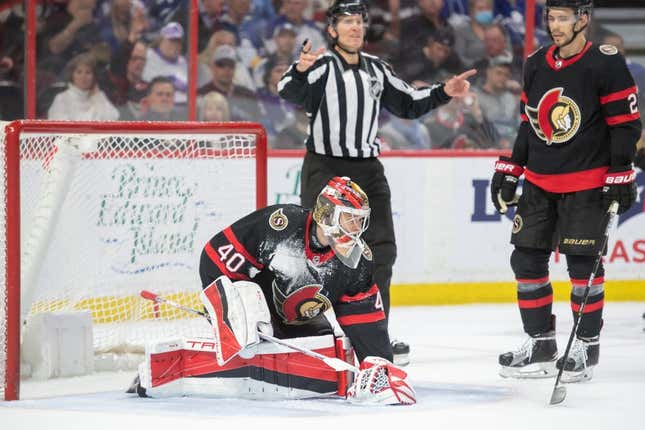 Apr 1, 2023; Ottawa, Ontario, CAN; Ottawa Senators goalie Mads Sogaard (40) covers the puck in the second period against the Toronto Maple Leafs at the Canadian Tire Centre.