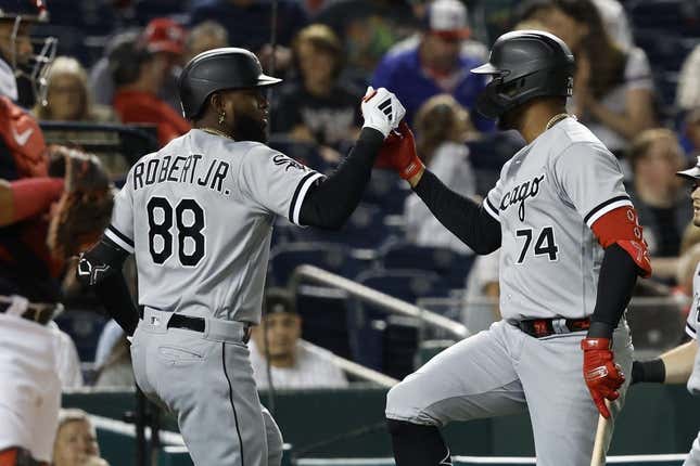 Sep 18, 2023; Washington, District of Columbia, USA; Chicago White Sox center fielder Luis Robert Jr. (88) celebrates with White Sox designated hitter Eloy Jimenez (74) after hitting a three run home run against the Washington Nationals during the fifth inning at Nationals Park.