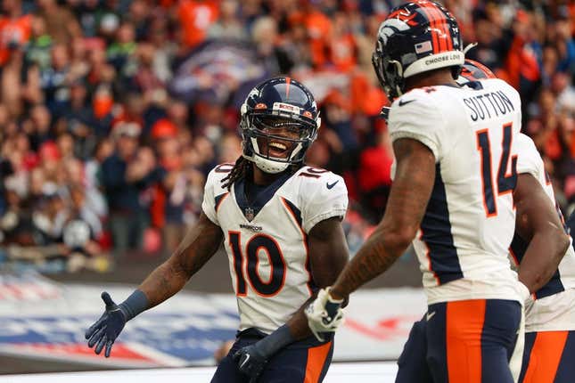 Oct 30, 2022; London, United Kingdom, Denver Broncos wide receiver Jerry Jeudy (10) is congratulated by wide receiver Courtland Sutton (14) after scoring a touchdown against the Jacksonville Jaguars in the second quarter during an NFL International Series game at Wembley Stadium.