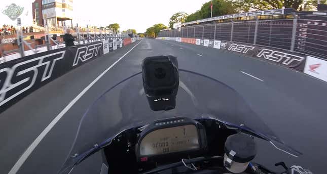 Still from on-bike footage of a BMW HP4 Race on the Isle of Man TT course.