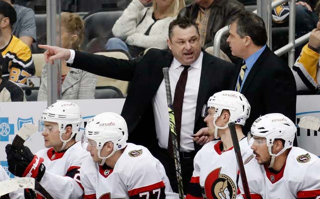 Mar 20, 2023; Pittsburgh, Pennsylvania, USA;  Ottawa Senators head coach D.J. Smith (left) talks with associate coach Jack Capuano (right) on the bench against the Pittsburgh Penguins at PPG Paints Arena.