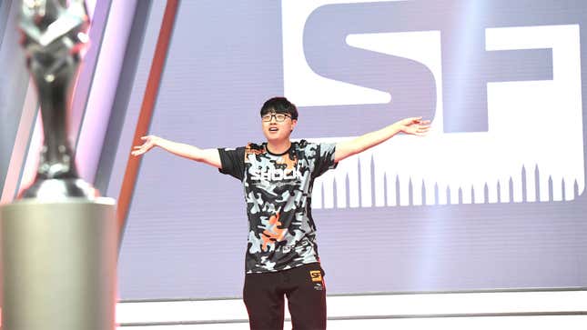 An Overwatch League San Francisco Shock player on stage at the Grand Finals 2019.