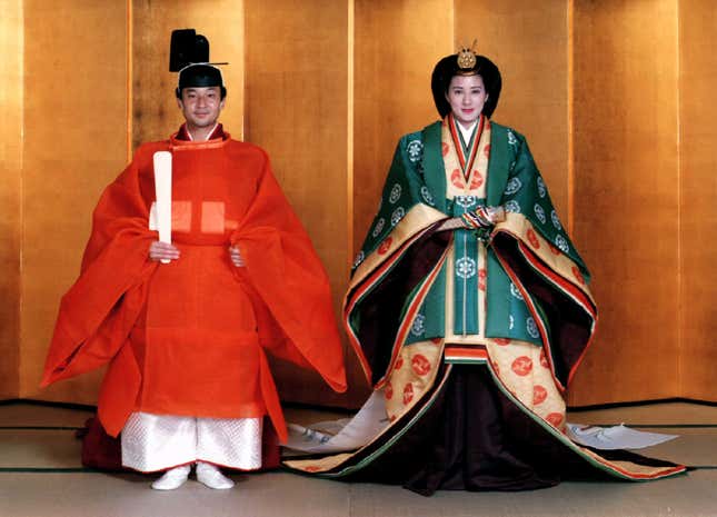 Crown Prince Naruhito and bride Masako in formal ancient ritual robes at their wedding in 1993.