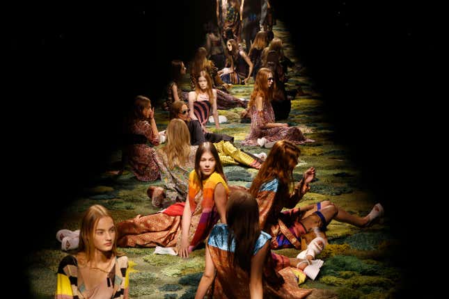 Models wear creations for Dries van Noten's Spring/Summer 2015 ready-to-wear fashion collection presented in Paris, France, Wednesday, Sept. 24, 2014. (AP Photo/Jacques Brinon)