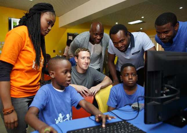 Zuckerberg watching on at a Cc Hub session of a summer coding camp for kids.