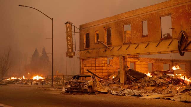 Businesses burn as the Dixie Fire tears through downtown Greenville, California.