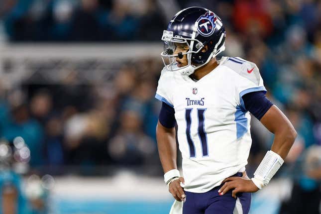 Jan 7, 2023;  Jacksonville, Florida, USA; Tennessee Titans quarterback Joshua Dobbs (11) reacts after giving up a fumble for a touchdown to Jacksonville Jaguars linebacker Josh Allen (41) during the fourth quarter at TIAA Bank Field.
