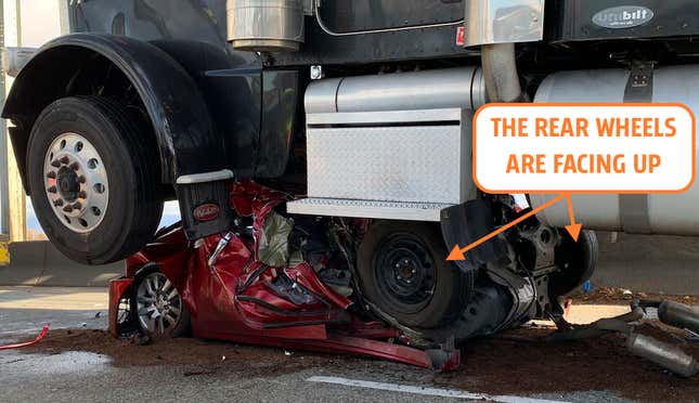 Image for article titled Nissan Altima Driver Survives Absurd Crash After Her Car Literally Folds Onto Itself Under A Big Rig