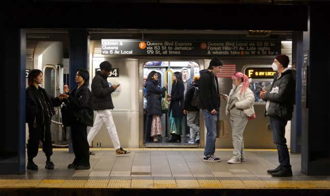 The northbound orange line platform of Broadway-Lafayette street, with an F train waiting to leave.