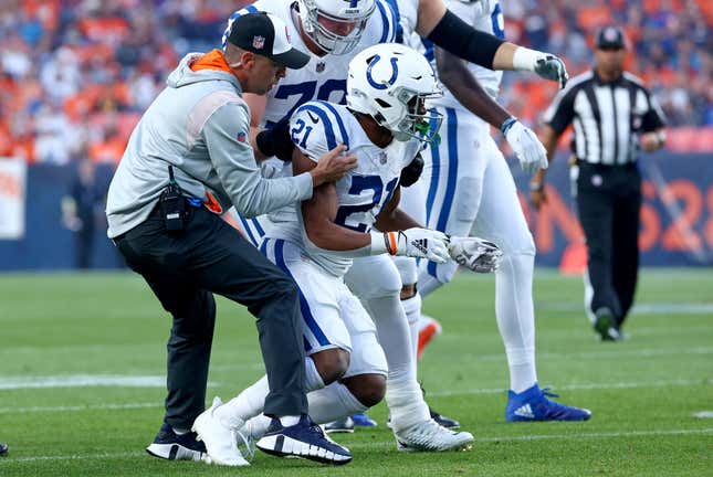 Colts running back Nyheim Hines struggles to get to his feet after sustaining a concussion Thursday night.