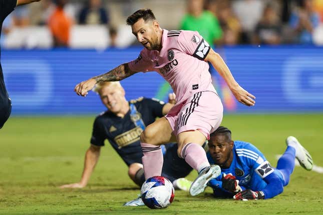 Aug 15, 2023; Chester, PA, USA; Inter Miami forward Lionel Messi (10) shoots the ball against Philadelphia Union goalkeeper Andre Blake (18) in front of defender Jakob Glesnes (5) at Subaru Park.