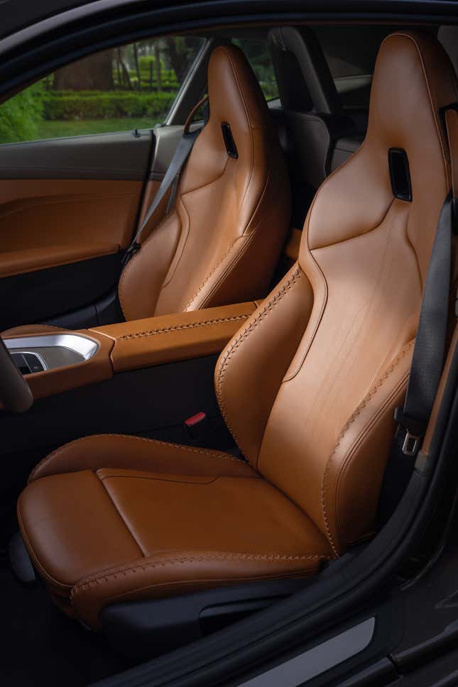 The front seats of the BMW shooting brake concept are upholstered in brown leather with baseball-style stitching.