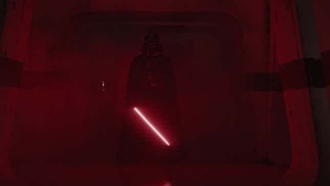 Darth Vader, wielding his lightsaber, bathed in red light and fog.