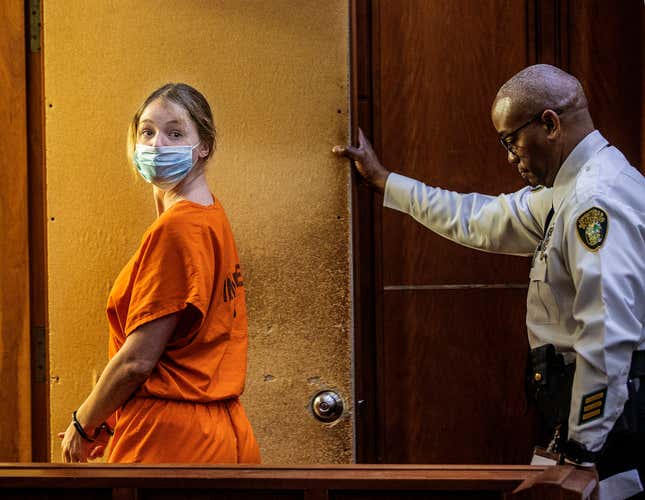 Social media model Courtney Clenney is led out of the courtroom following an evidentiary hearing, Tuesday, Sept. 6, 2022, in Miami. Clenney, 26, is charged with murdering her boyfriend Christian Obumseli.