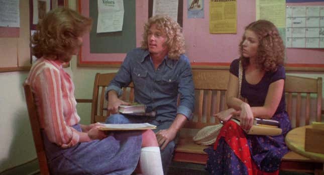 Miss Collins sitting down with Tommy and Sue to discuss what theit intend to do with Carrie White.