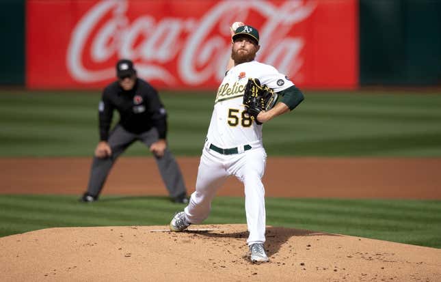 May 29, 2023; Oakland, California, USA; Oakland Athletics starting pitcher Paul Blackburn (58) delivers a pitch against the Atlanta Braves during the first inning at Oakland-Alameda County Coliseum.