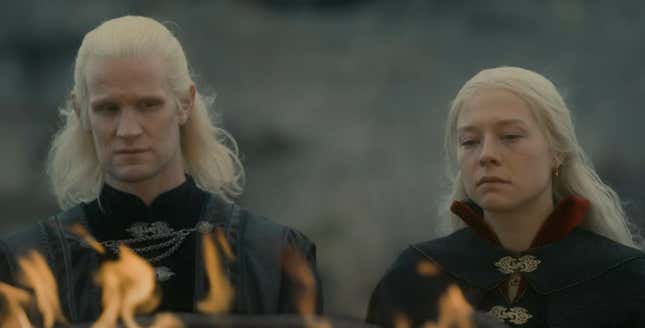 Daemon and Rhaenyra look at a small fire