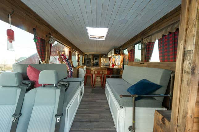 Image for article titled This Beautiful Coach Bus RV Has A Basement Bedroom And A Full Kitchen